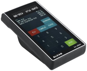 Kasa fiskalna Slim K1 widoczna z boku, pokazująca smukłą obudowę i krawędź dotykowego wyświetlacza.